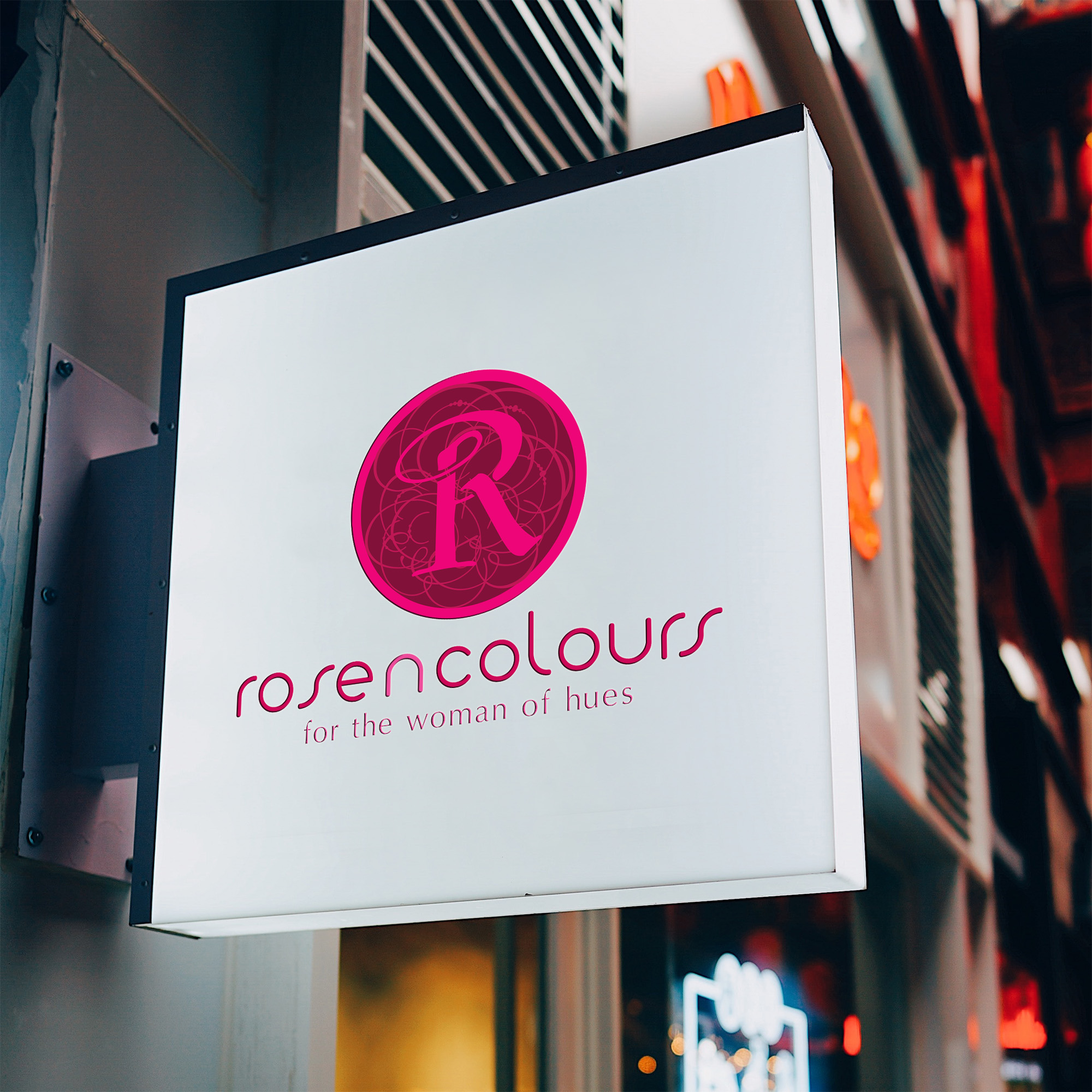 Rose n Colours logo on an outdoor display